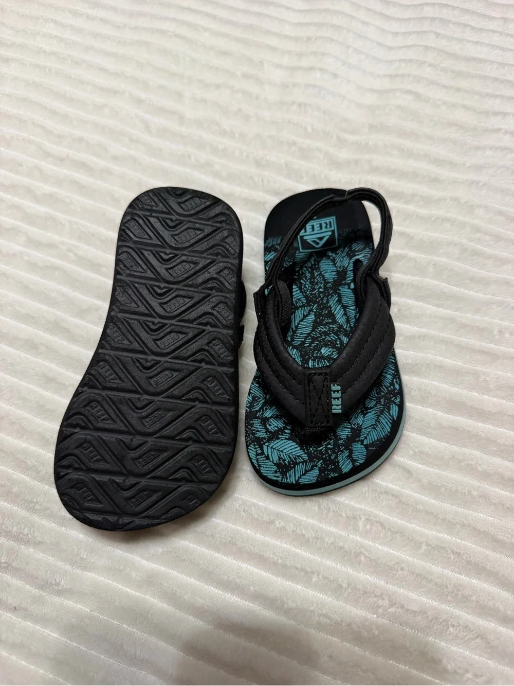 Reef Kids Black and Teal Leaf-Print Flip Flops